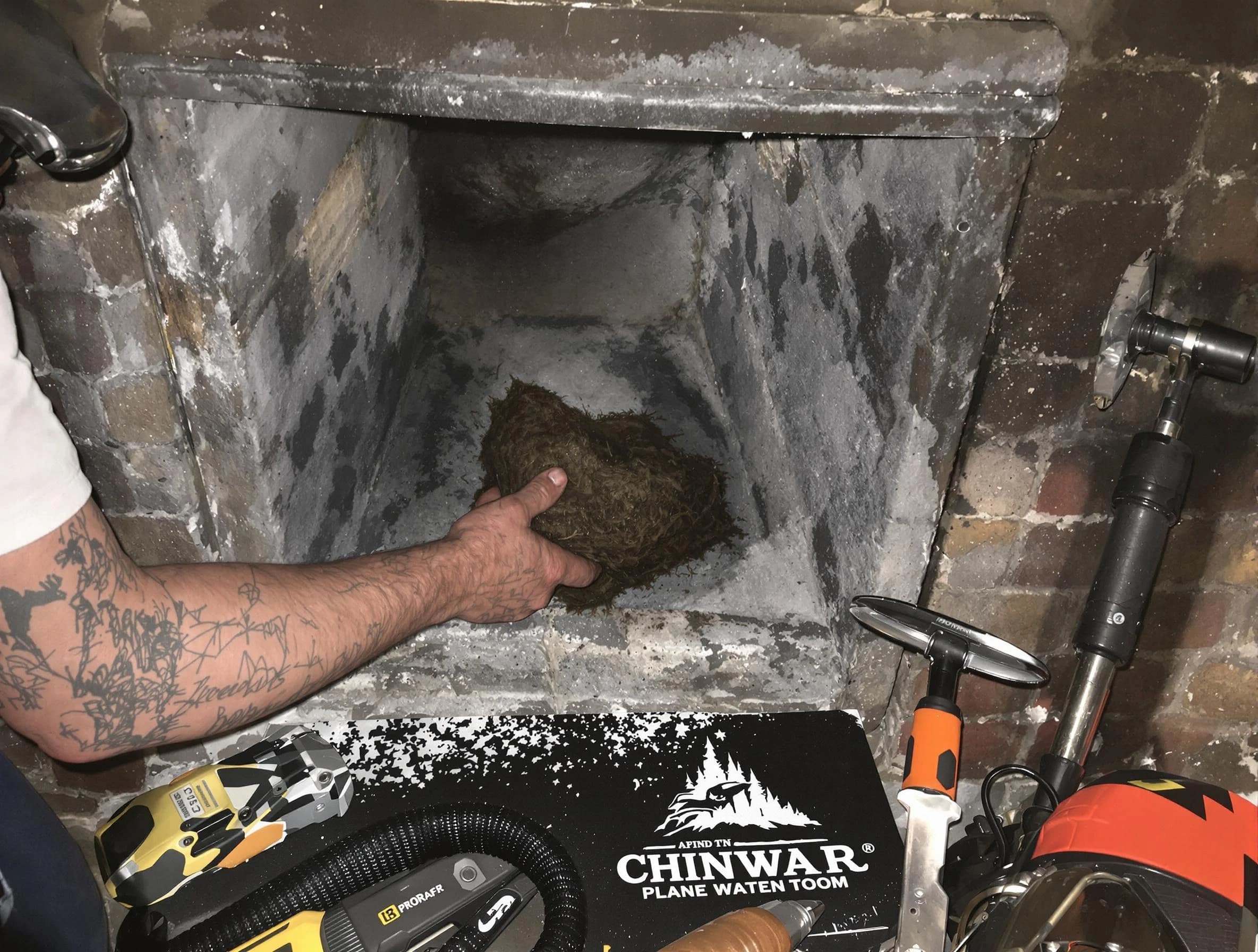 Mableton Chimney Sweep safely removing debris and screening chimney in Mableton, GA