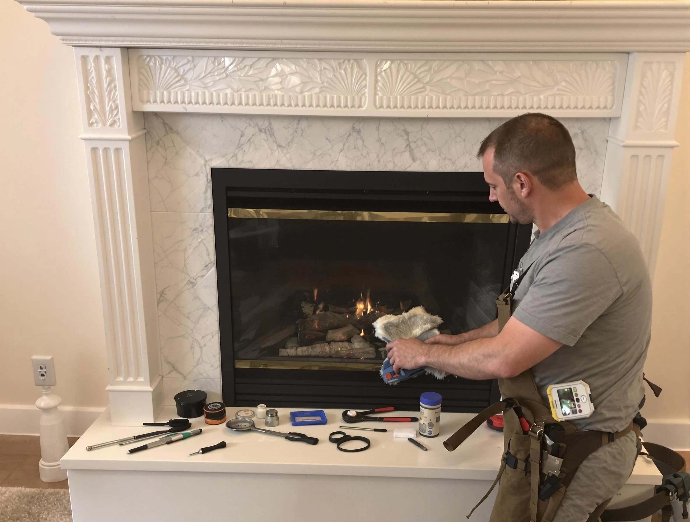 Mableton Chimney Sweep performing fireplace maintenance in Mableton, GA